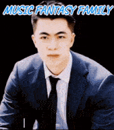 a picture of a man in a suit and tie with the words music fantasy family above him