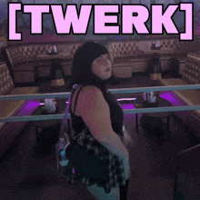a woman dancing in a room with the words [ twerk ] on the bottom