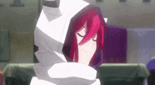 a close up of a person with red hair wearing a white hooded jacket .