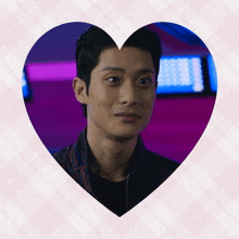 a picture of a man in a heart shaped border