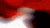a red white and black background that looks like a swirl