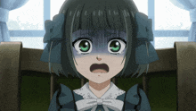 a little girl with green eyes and a bow on her head looks shocked