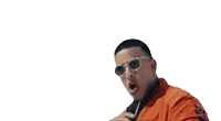 a man wearing sunglasses and a ring giving the middle finger