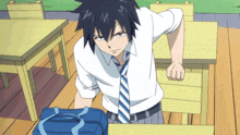 a boy in a white shirt and tie is standing in front of a desk
