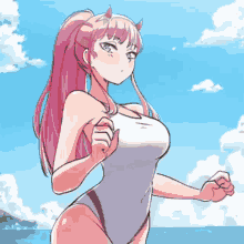 a girl with pink hair and horns is wearing a white swimsuit and standing on a beach .