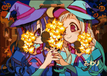 a cartoon of two girls in witch hats holding fireworks with the word " owari " on the bottom right