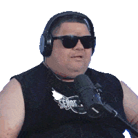 a man wearing headphones and a shirt that says señor on it