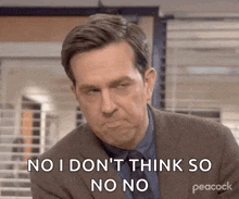 a man in a suit and tie is making a funny face and saying no i don 't think so no no .
