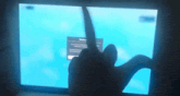 a person 's hand is pointing at a computer screen that says ' recovery ' on it