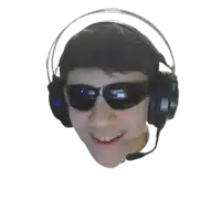 a man wearing headphones and sunglasses is smiling .