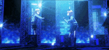 two anime girls are dancing on a stage in front of a city skyline .