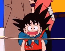 a close up of a cartoon character standing next to a fence .