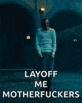 a man is standing in front of a building with the words layoff me motherfuckers on the bottom