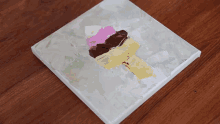 a painting of an ice cream cone is being painted