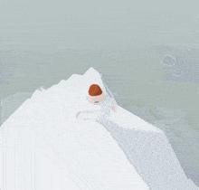 a cartoon character laying on a snowy hill