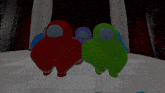 a red among us character is standing next to a green and blue character