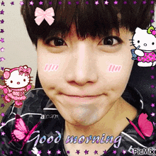 a picture of a boy with hello kitty and butterflies on his face and the words good morning