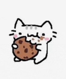 a cat is holding a cookie in its mouth .