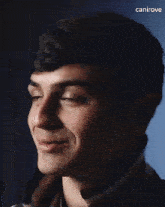 a close up of a man 's face with the words canirove written on the bottom