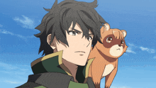 a man with a small animal on his shoulder