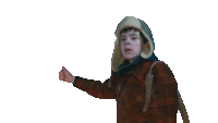 a young boy wearing a plaid shirt and hat is giving a thumbs up