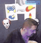 a man eating a meal in front of a sign that says 2024 on it