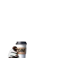 a cup of coffee with the letters gm written on it