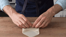 Rolling It Up Brian Lagerstrom GIF - Rolling It Up Brian Lagerstrom Wrapping The Ingredients GIFs