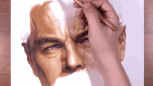 a drawing of a man 's face with a pencil