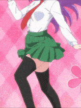 a girl in a green skirt and black thigh high socks is dancing