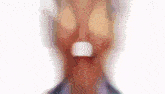 a close up of a person 's face with a white circle in the middle of it