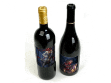 two bottles of wine one of which has a woman on it