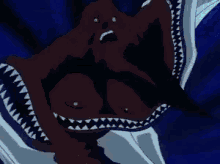a cartoon character is being attacked by a monster with a huge mouth .