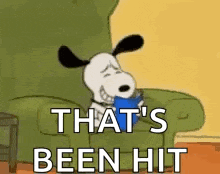 snoopy is sitting in a chair holding a cup of coffee and says `` that 's been hit '' .