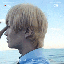 a man 's face is being recorded in a video that says rec