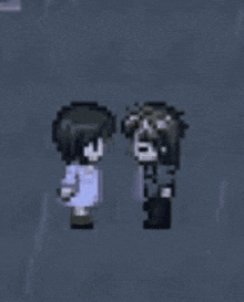 a couple of pixel art characters standing next to each other on a dark background .