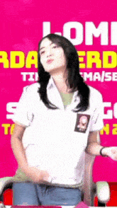 a woman in a white uniform is dancing in front of a pink background that says " lom "