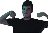 a man in a black shirt flexes his muscles against a white background