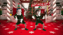 Jimmy Elf GIF - Jimmy Elf Gift Pick Up GIFs