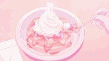 a plate of pancakes with whipped cream and strawberries