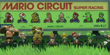 a sign that says mario circuit super racing with a bunch of mario characters