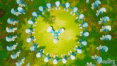 a bunch of smurfs in a circle with the word smurfs on the bottom