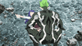 a girl is laying on the ground next to a monster