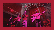 a group of men are playing guitars and singing on a stage with the word haute in the upper right corner