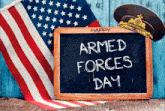 a chalkboard says happy armed forces day