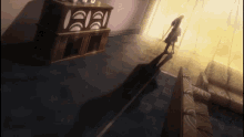 a shadow of a person is cast on a couch in a room with a clock on the wall