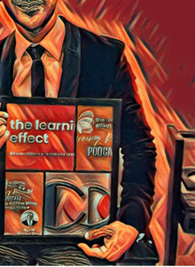 a man in a suit and tie is holding a book titled the learn effect