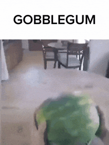 a picture of a gobblegum sitting on a table in a dining room
