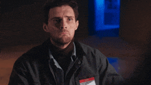 a man with a name tag that says to