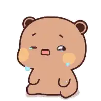 a brown teddy bear is crying with tears running down its face .